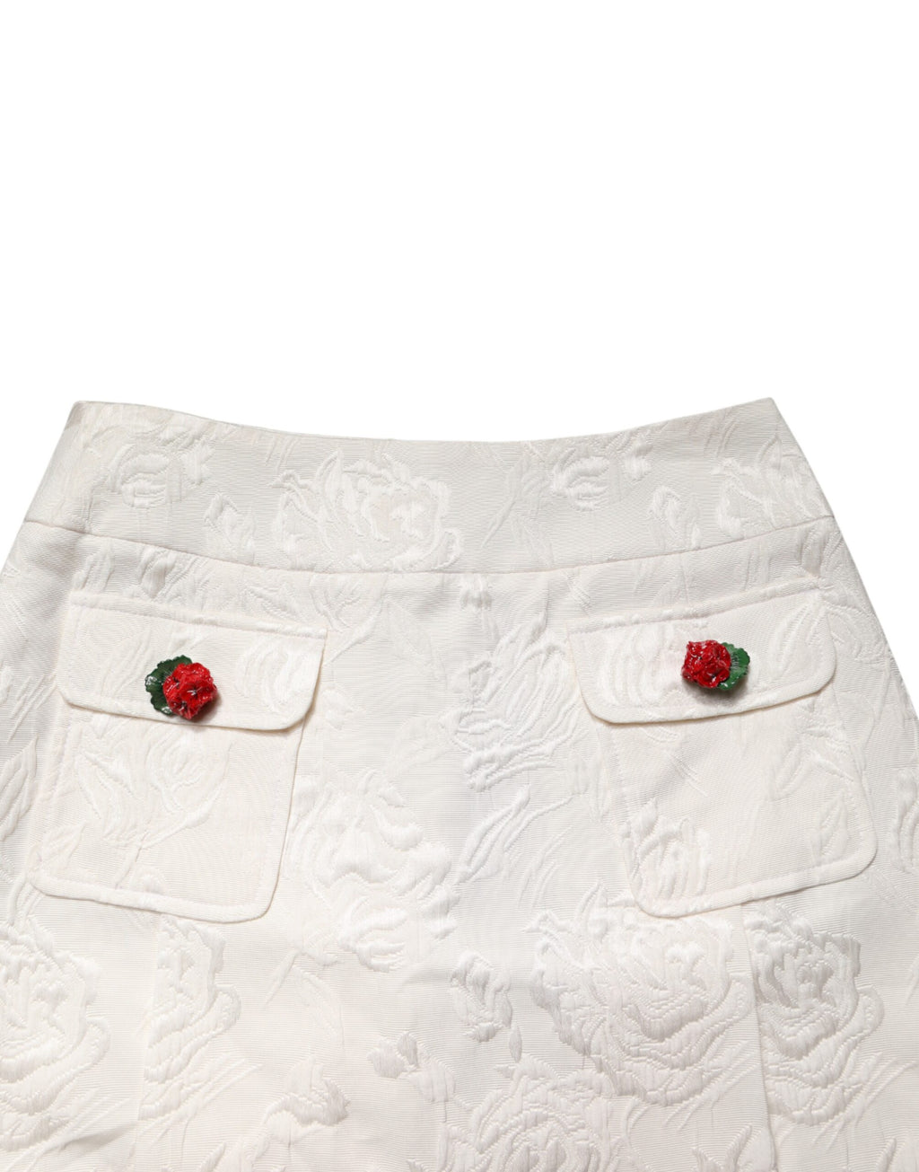 Jupe courte en brocart floral blanche de Dolce & Gabbana, taille haute, style élégant et sophistiqué.