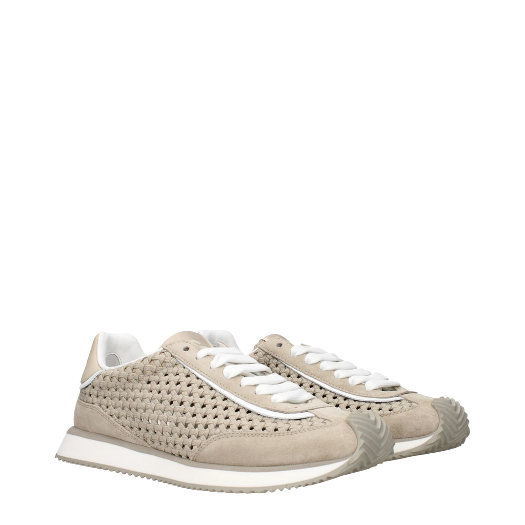 Baskettes basses en tissu beige Dolce & Gabbana, modernes et élégantes, avec semelle blanche et design épuré.