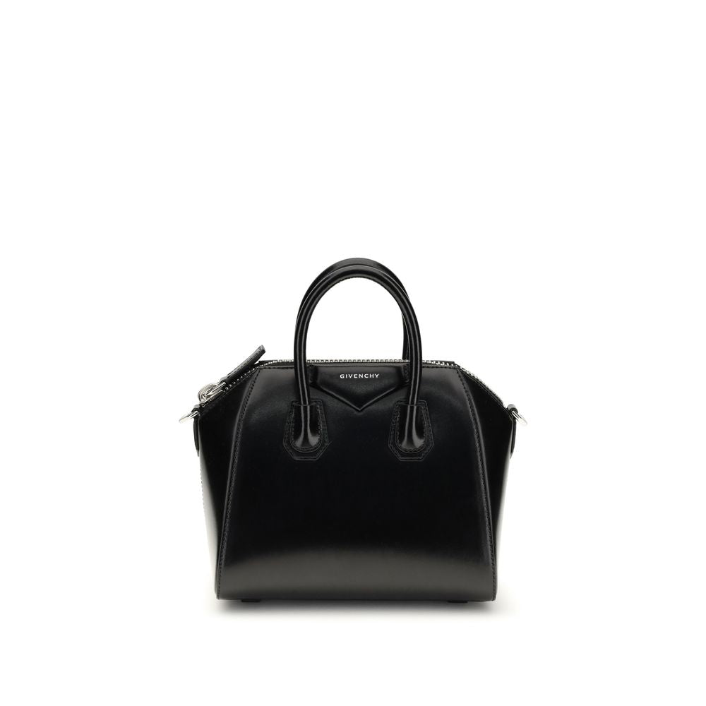 Sac à main Givenchy Bos Taurus en cuir de veau noir, élégant et sophistiqué, avec détails de finition raffinés.