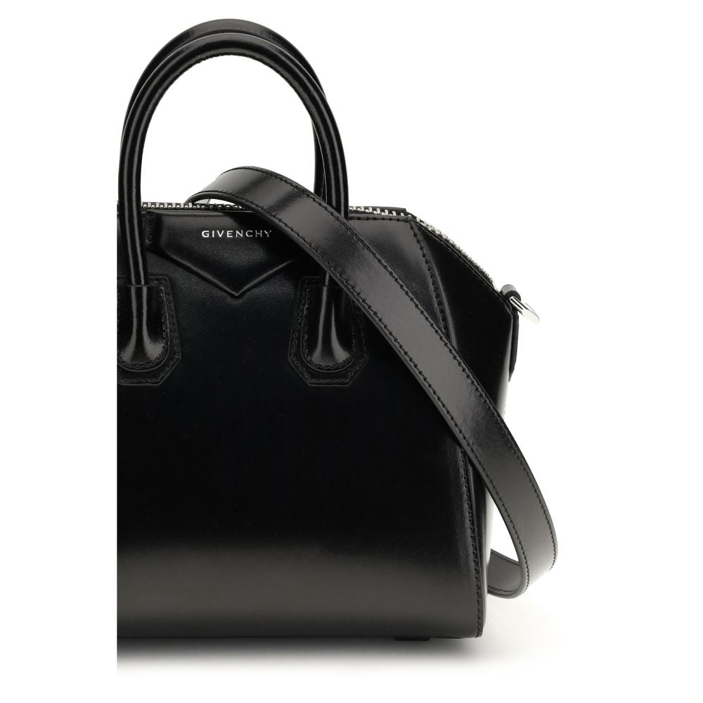 Sac à main Givenchy Bos Taurus en cuir de veau noir, élégant et sophistiqué, avec détails raffinés.