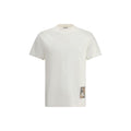 T-shirt blanc en coton de la marque Burberry, coupe classique, logo discret visible sur le devant.