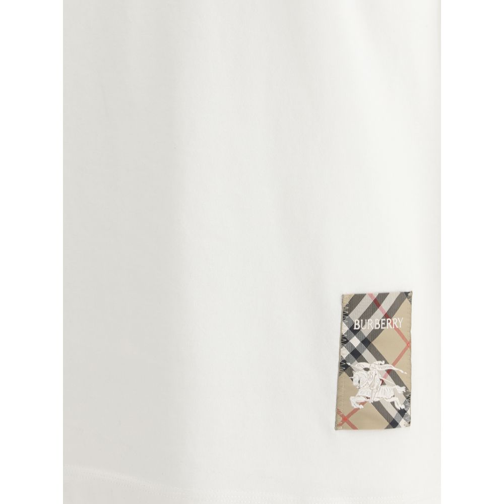 T-shirt blanc en coton de marque Burberry, coupe classique, avec logo discret visible sur le devant.