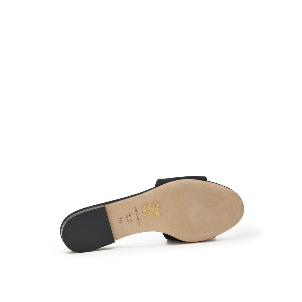 Chaussons en polyester noir de Dolce & Gabbana, confortables et élégants, avec design contemporain.