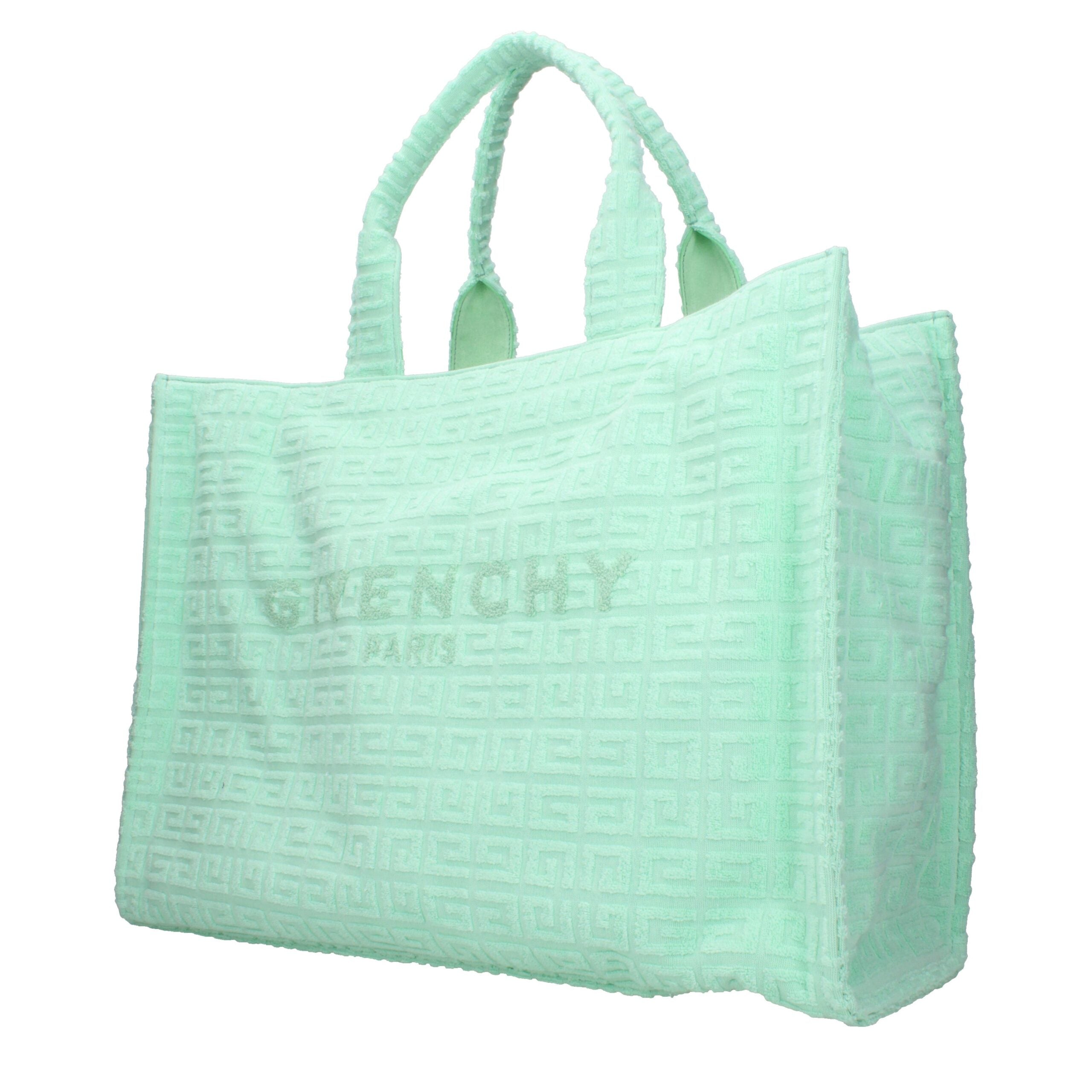 Sac à main Givenchy en tissu vert, élégance et style, avec poignées et détails sophistiqués, visible en gros plan.