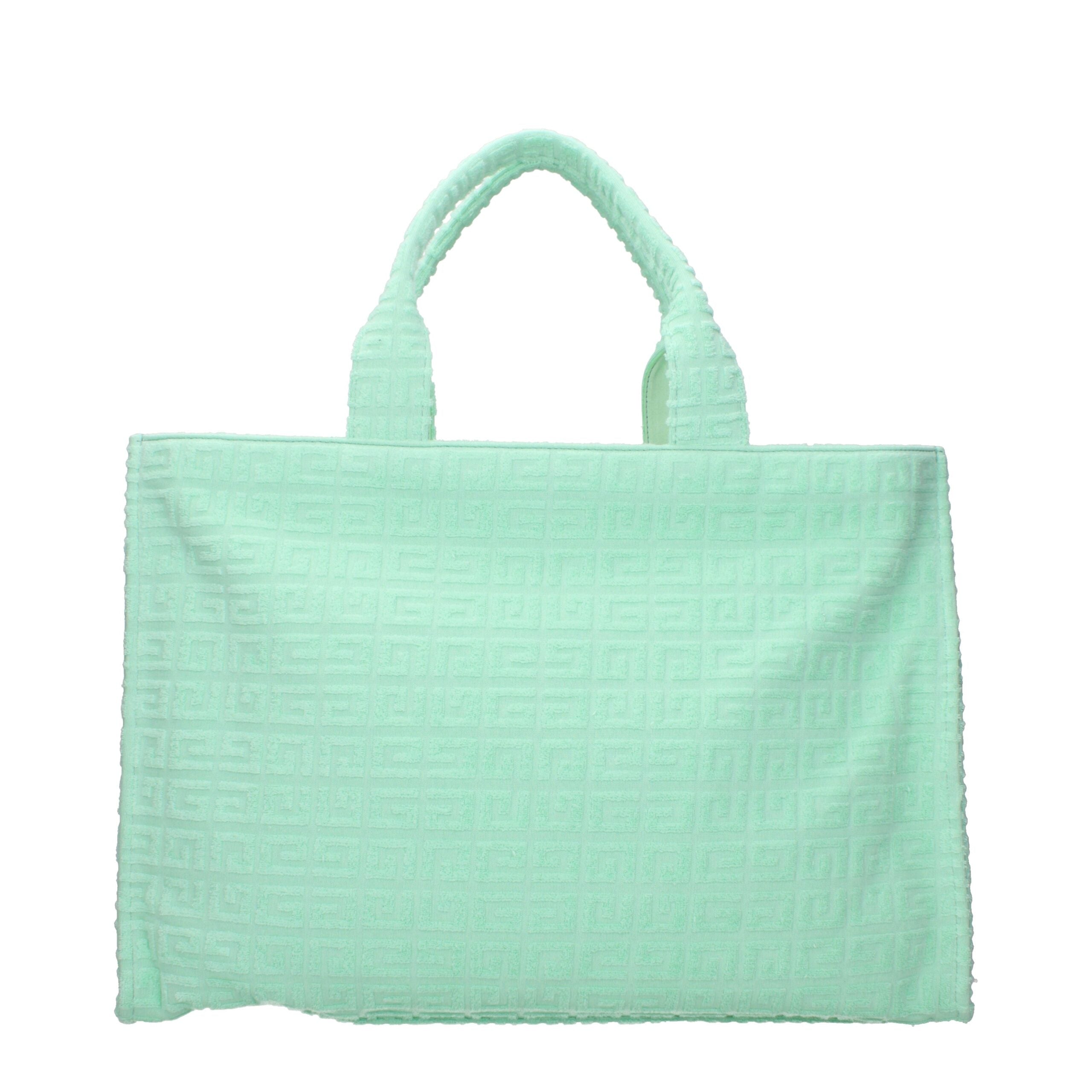 Sac à main Givenchy en tissu vert avec poignées, élégant et sophistiqué, visible en détail dans l'image.