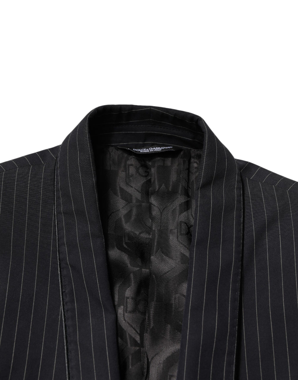 Veste blazer Dolce & Gabbana en tissu noir à rayures, avec un bouton unique, élégante et ajustée.