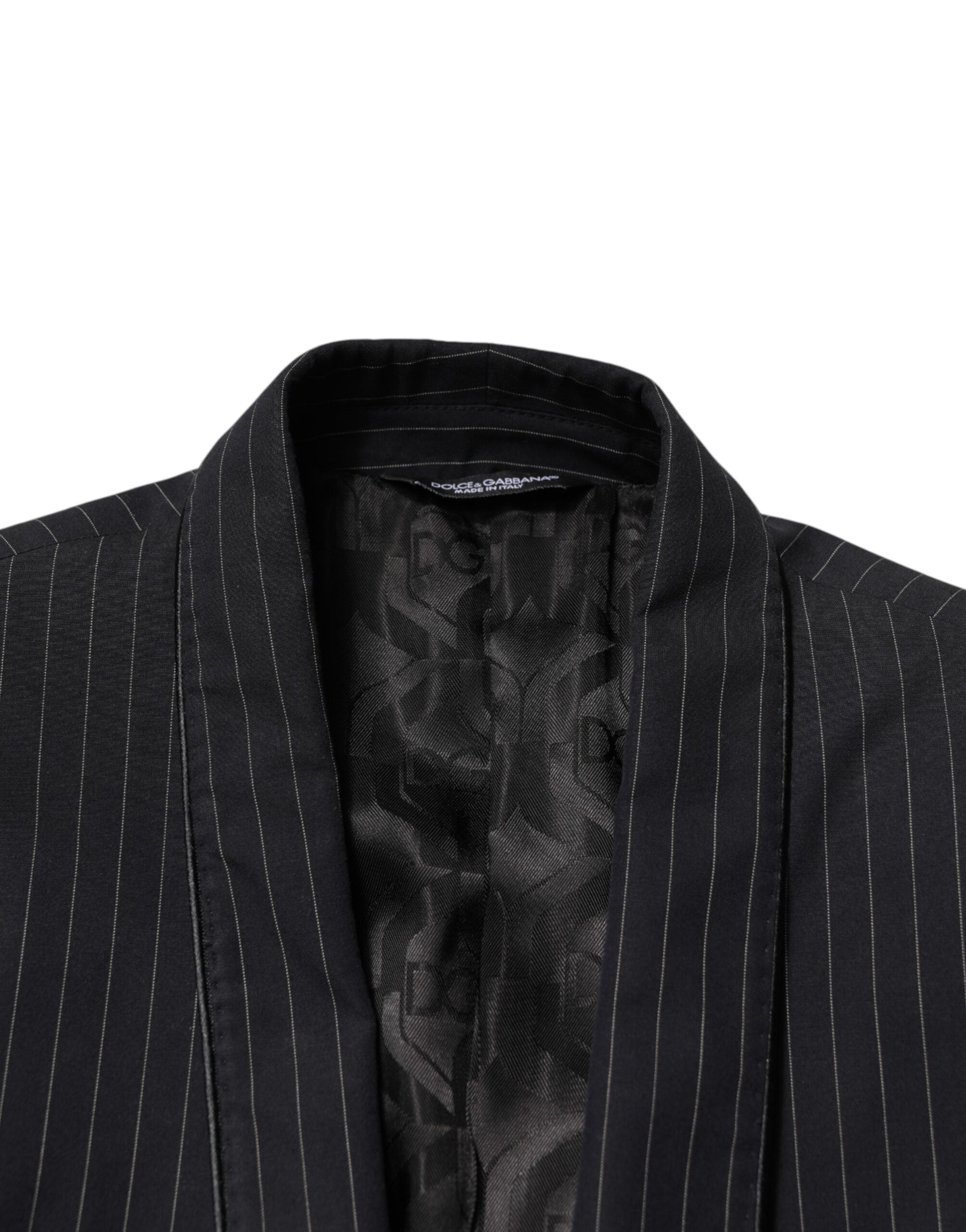 Veste blazer Dolce & Gabbana en tissu noir à rayures, avec un bouton unique, élégante et ajustée.