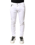 Jeans homme Dolce & Gabbana en denim blanc stretch skinny, vue de face avec détails de couture et coupe ajustée.