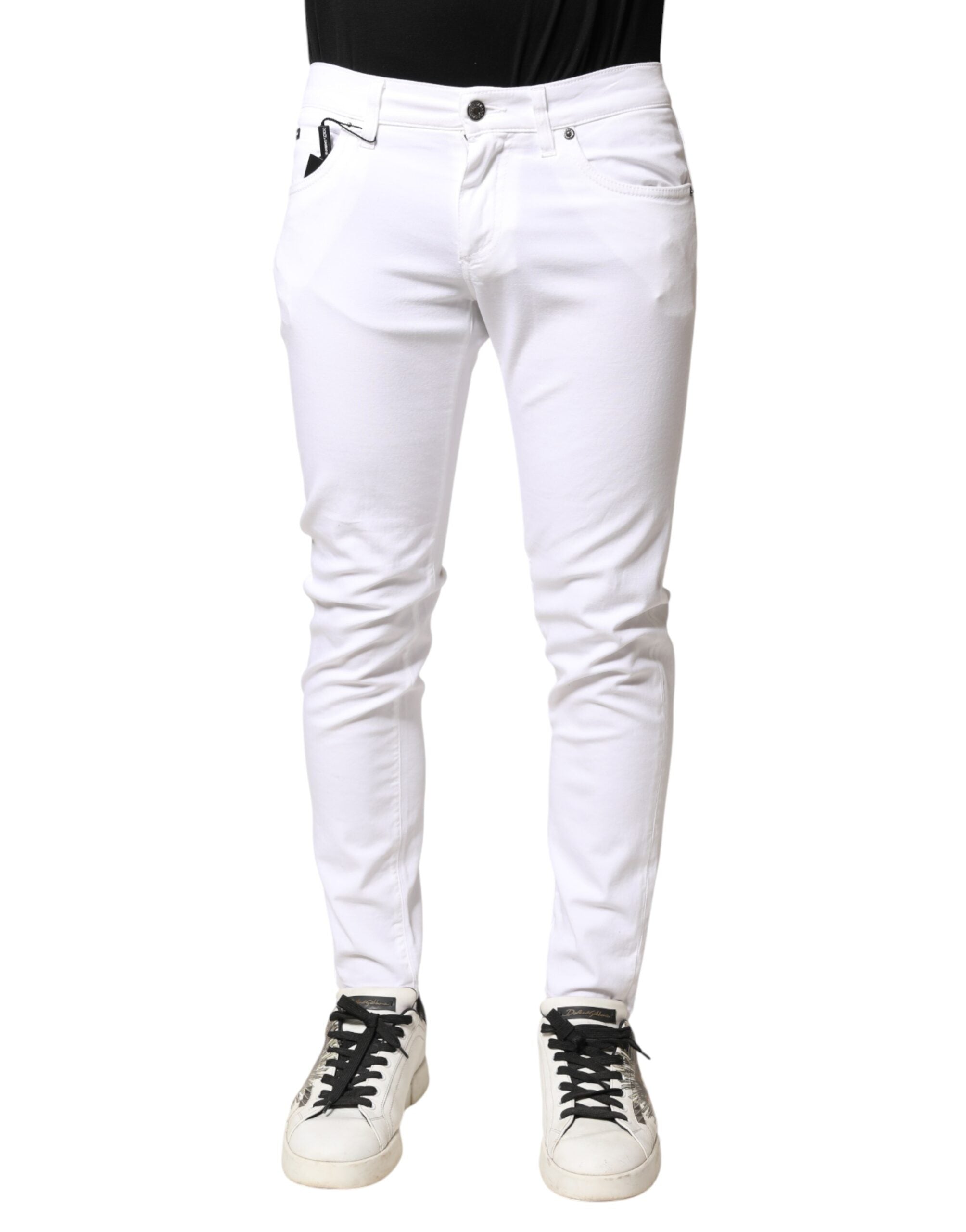 Jeans homme Dolce & Gabbana en denim blanc stretch skinny, vue de face avec détails de couture et coupe ajustée.