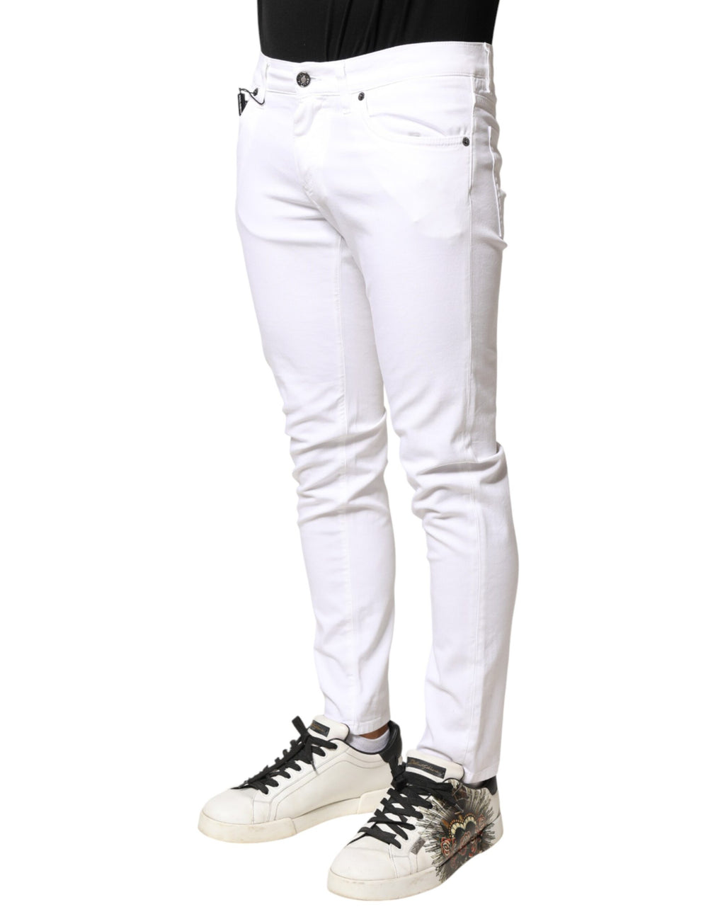 Jeans skinny en coton stretch blanc Dolce & Gabbana pour homme, coupe ajustée et moderne, visible détails du denim.