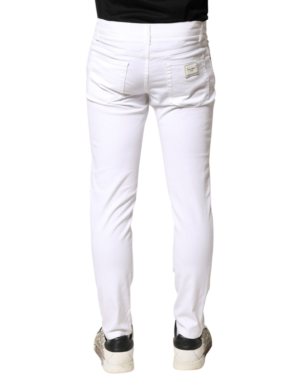 Jeans slim en denim blanc en coton stretch de Dolce & Gabbana pour homme, coupe skinny, visible sur l'image.