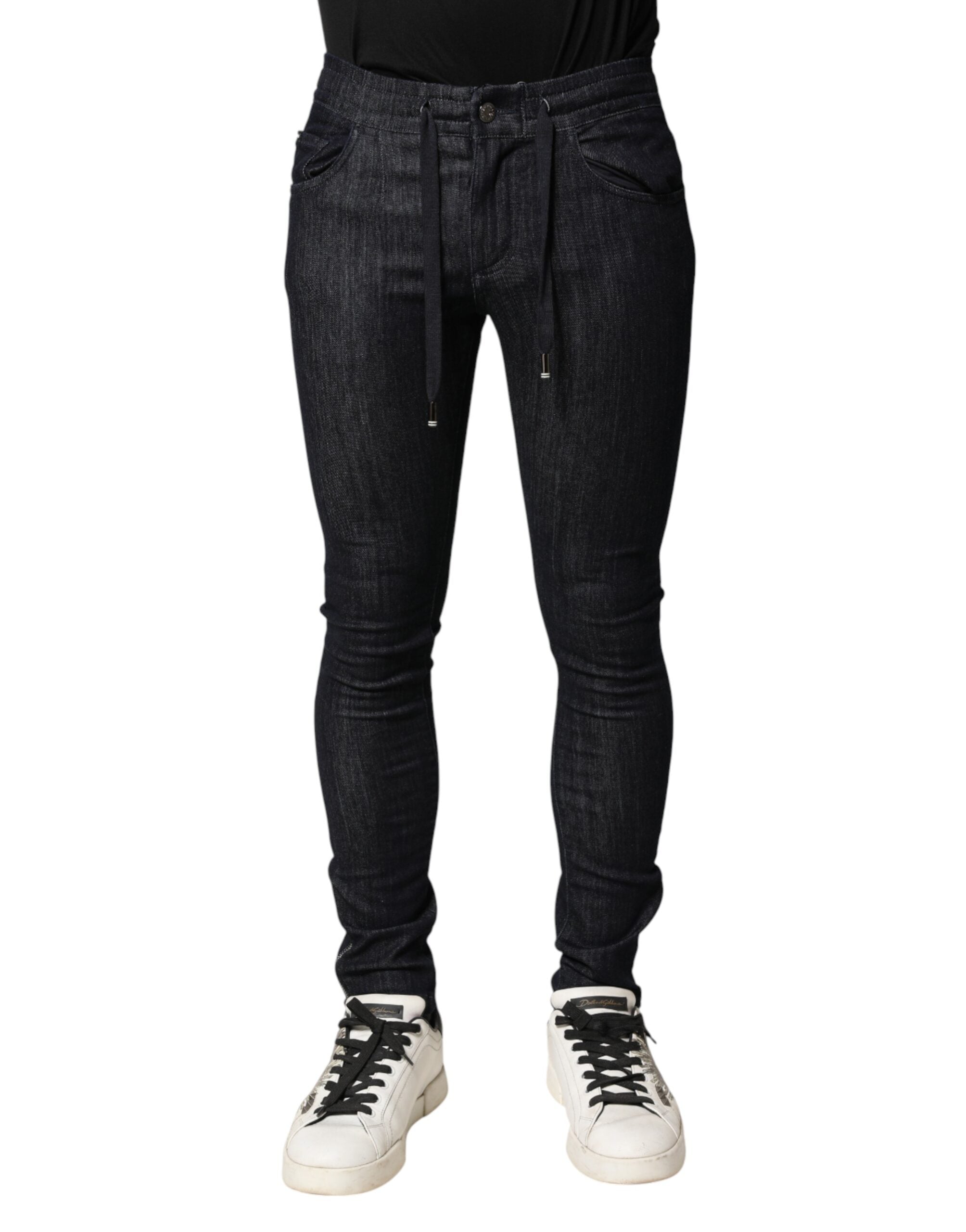 Jeans homme skinny en coton stretch noir de Dolce & Gabbana, coupe ajustée, détails classiques et design élégant.