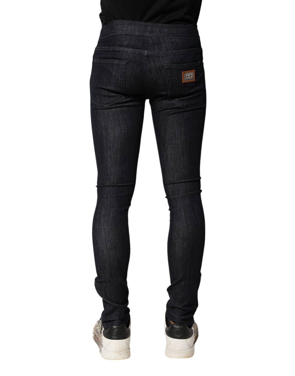 Jeans slim en denim noir en coton stretch pour homme de Dolce & Gabbana, ajustés et modernes, visibles en gros plan.