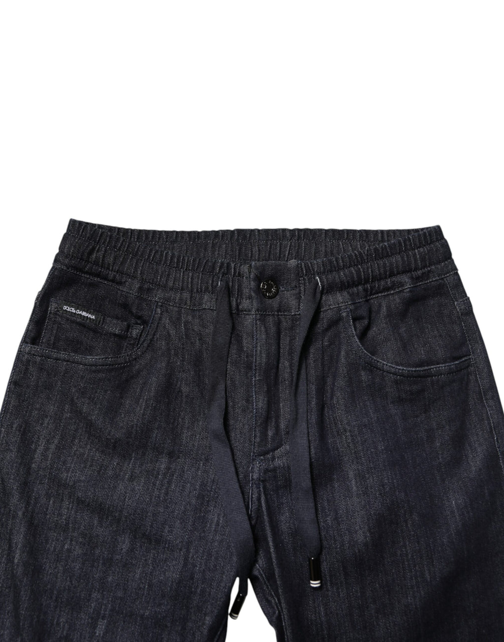 Jeans homme Dolce & Gabbana en coton stretch noir, coupe skinny denim, visible sur le mannequin portant le produit.
