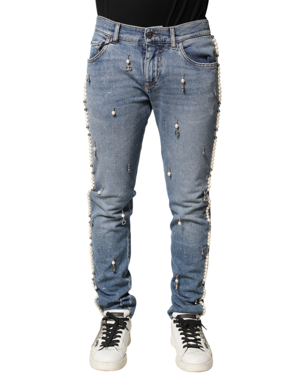 Jeans skinny en denim coton bleu Dolce & Gabbana avec embellissements, vue de face.