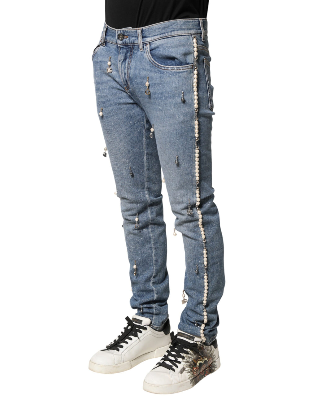 Jeans skinny en denim coton bleu Dolce & Gabbana avec embellissements visibles, mode élégante et tendance.