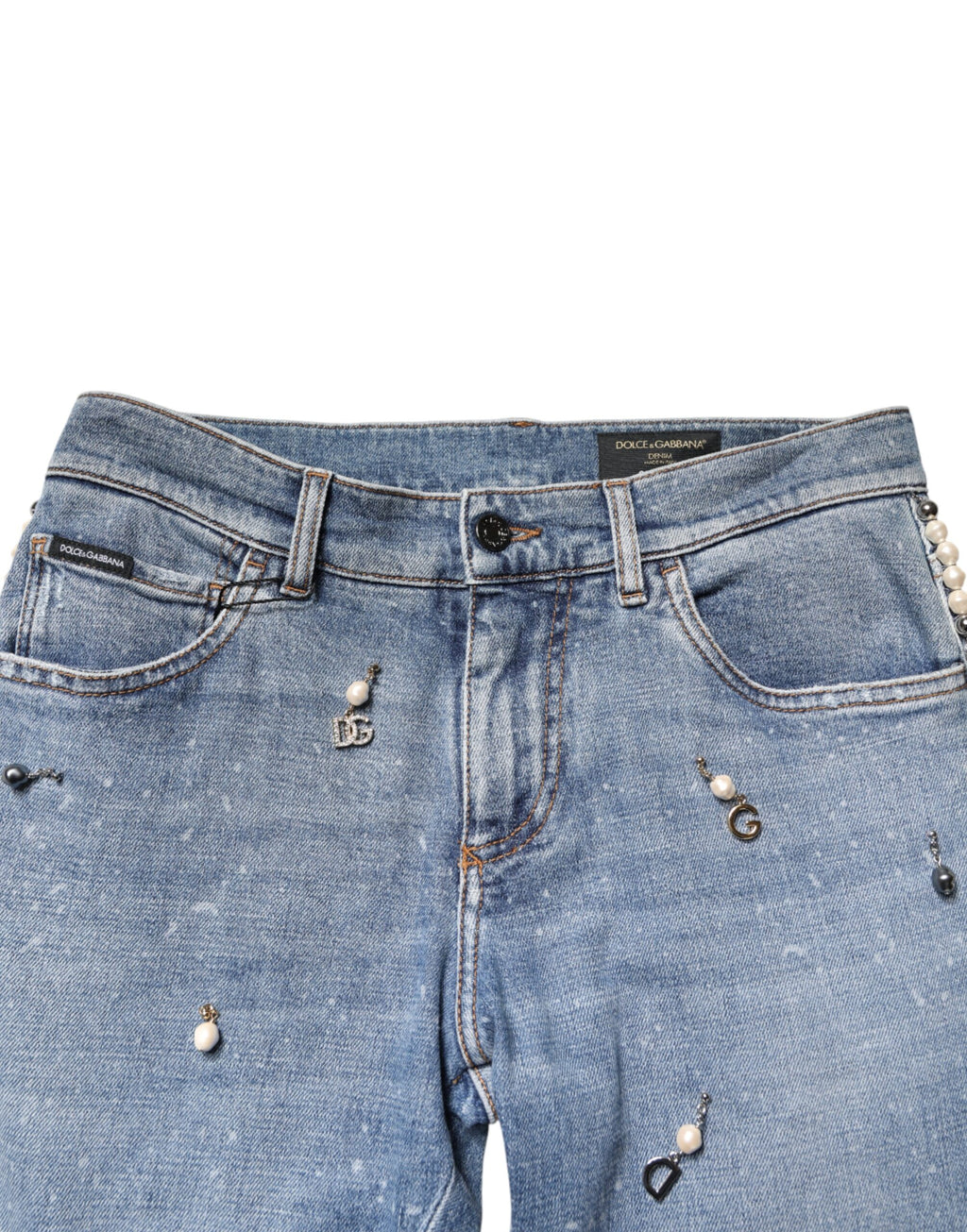 Jeans skinny en denim coton bleu Dolce & Gabbana avec embellissements visibles et détails élégants.