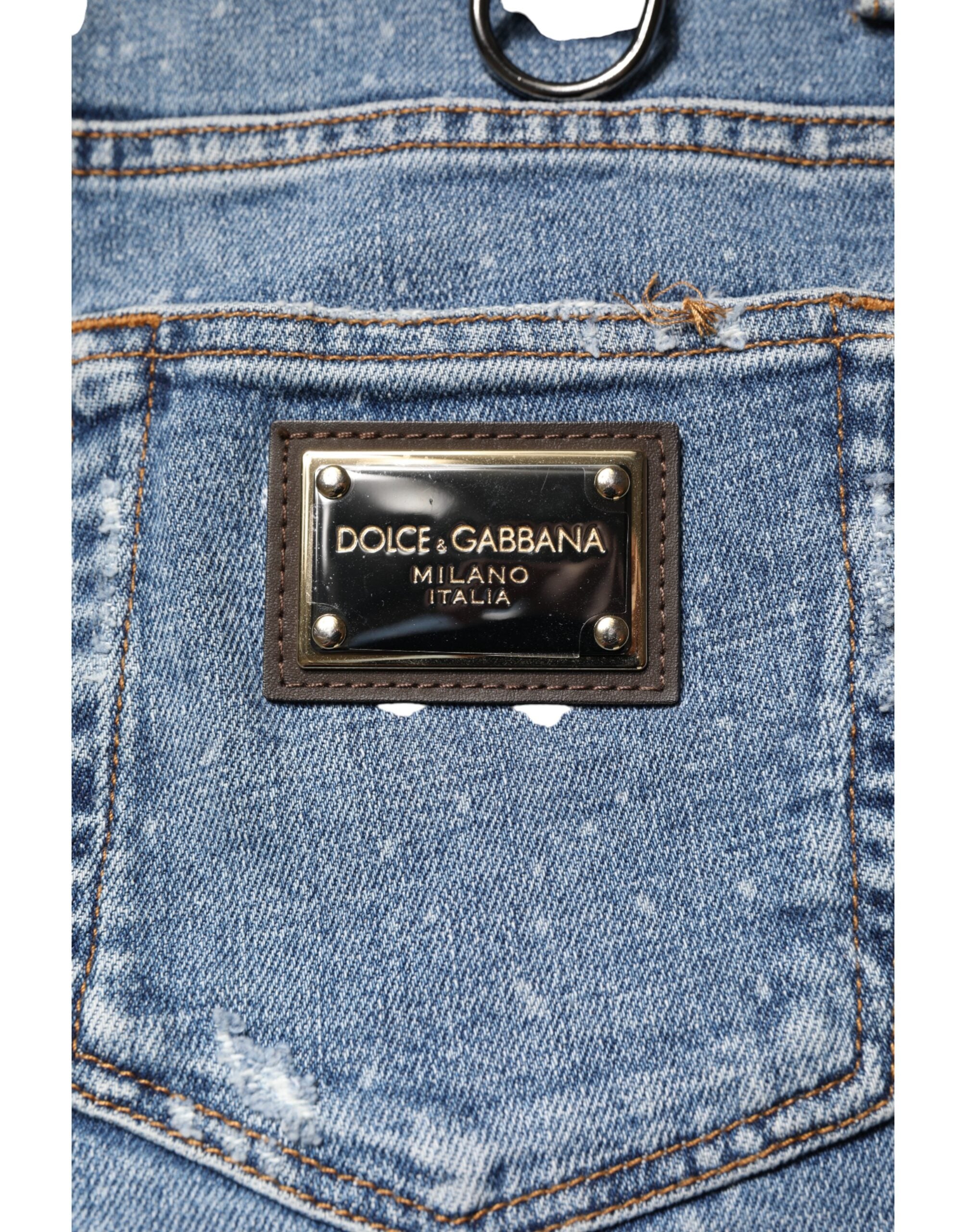 Jeans skinny en denim blanc Dolce & Gabbana avec embellissements en coton, style moderne et élégant, visible dans l'image.