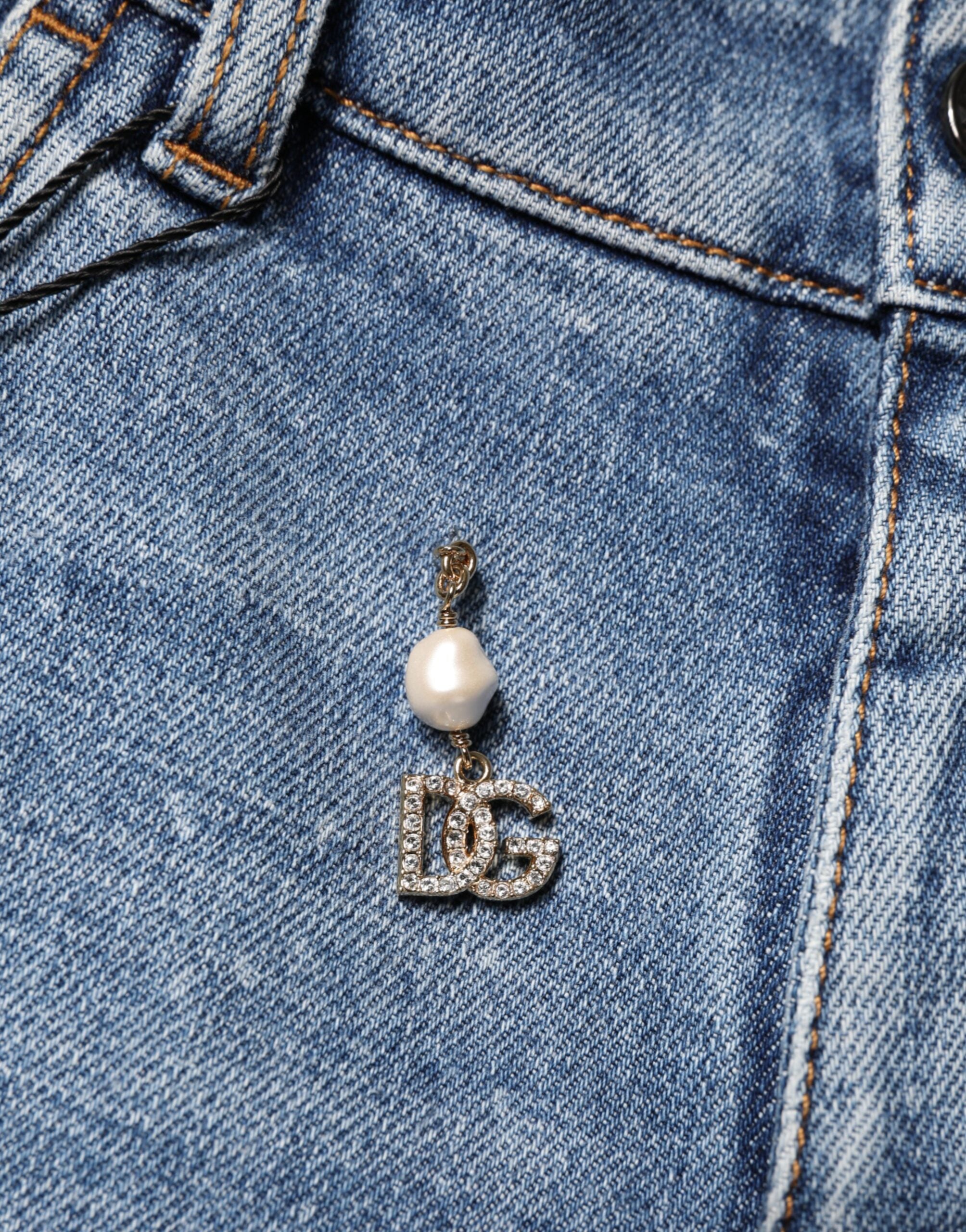 Jeans skinny en denim coton bleu Dolce & Gabbana avec embellissements, visibles sur l'image.