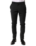 Pantalon homme Dolce & Gabbana en laine noire, costume formel, coupe droite, détail élégant, porté sur mannequin.