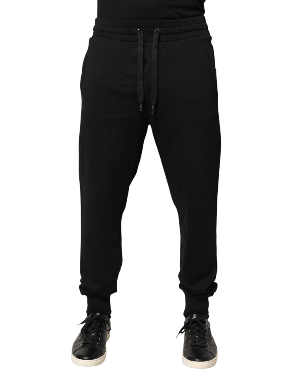 Pantalon jogging noir en coton Dolce & Gabbana à taille moyenne, décontracté et confortable, vue de face.