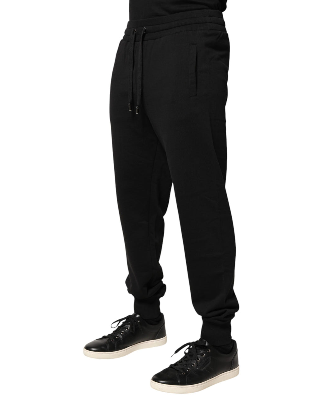 Pantalon jogging Dolce & Gabbana en coton noir, taille mi-hauteur, style décontracté et confortable.