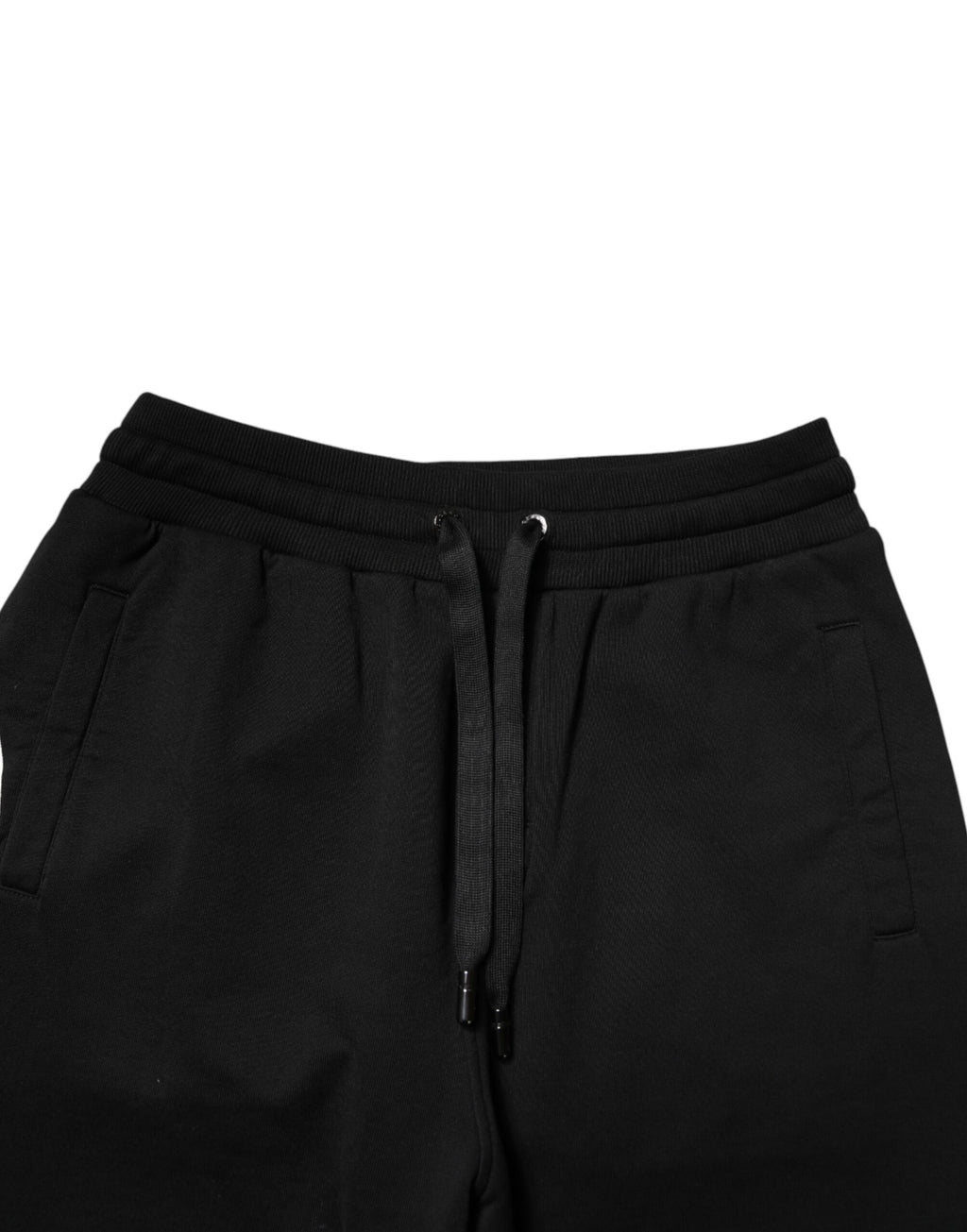 Pantalon jogger noir en coton Dolce & Gabbana, taille mi-hauteur, style décontracté et confortable, vue de face.