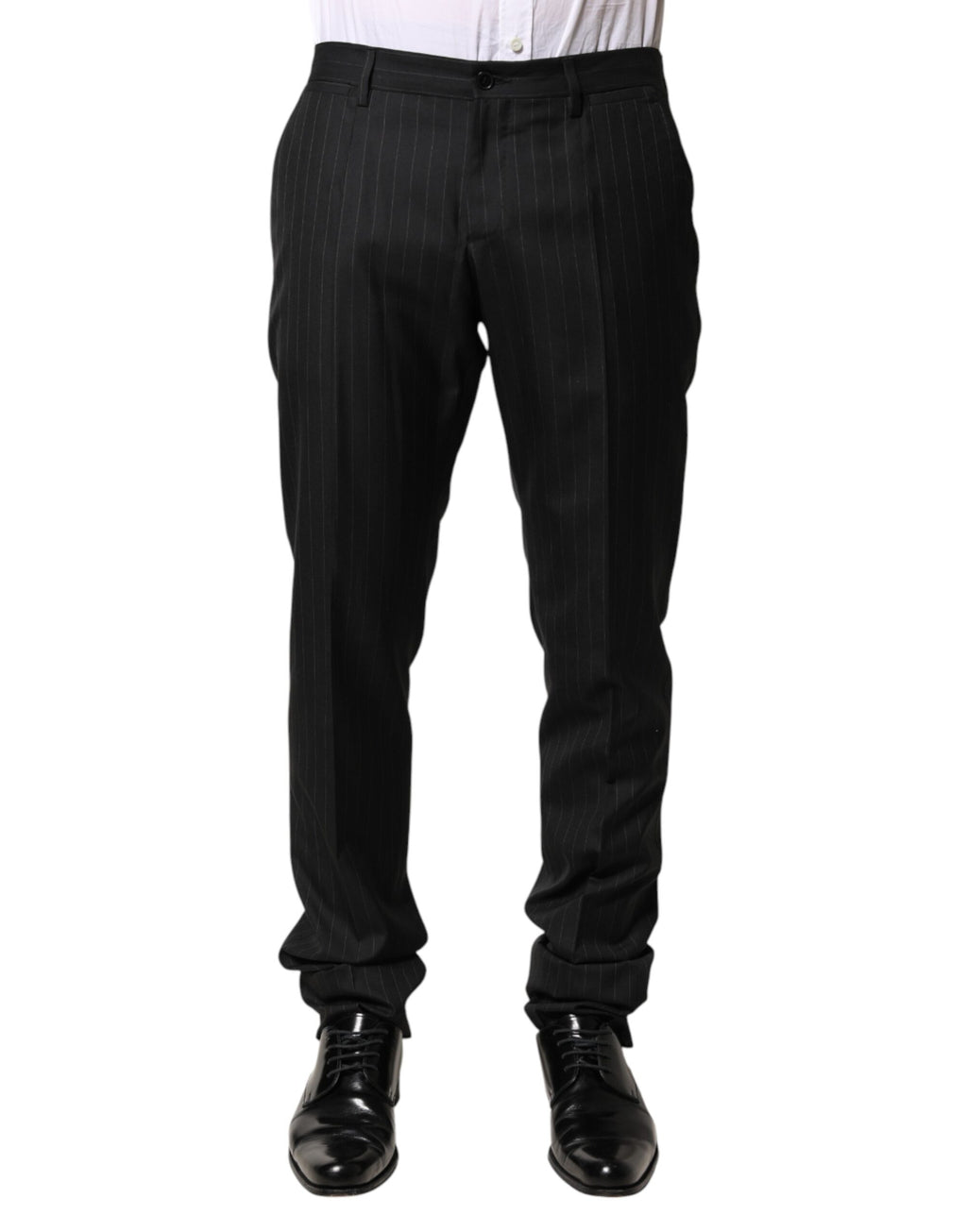 Pantalon homme Dolce & Gabbana en laine noire à rayures, style habillé avec coupe ajustée et détails élégants.