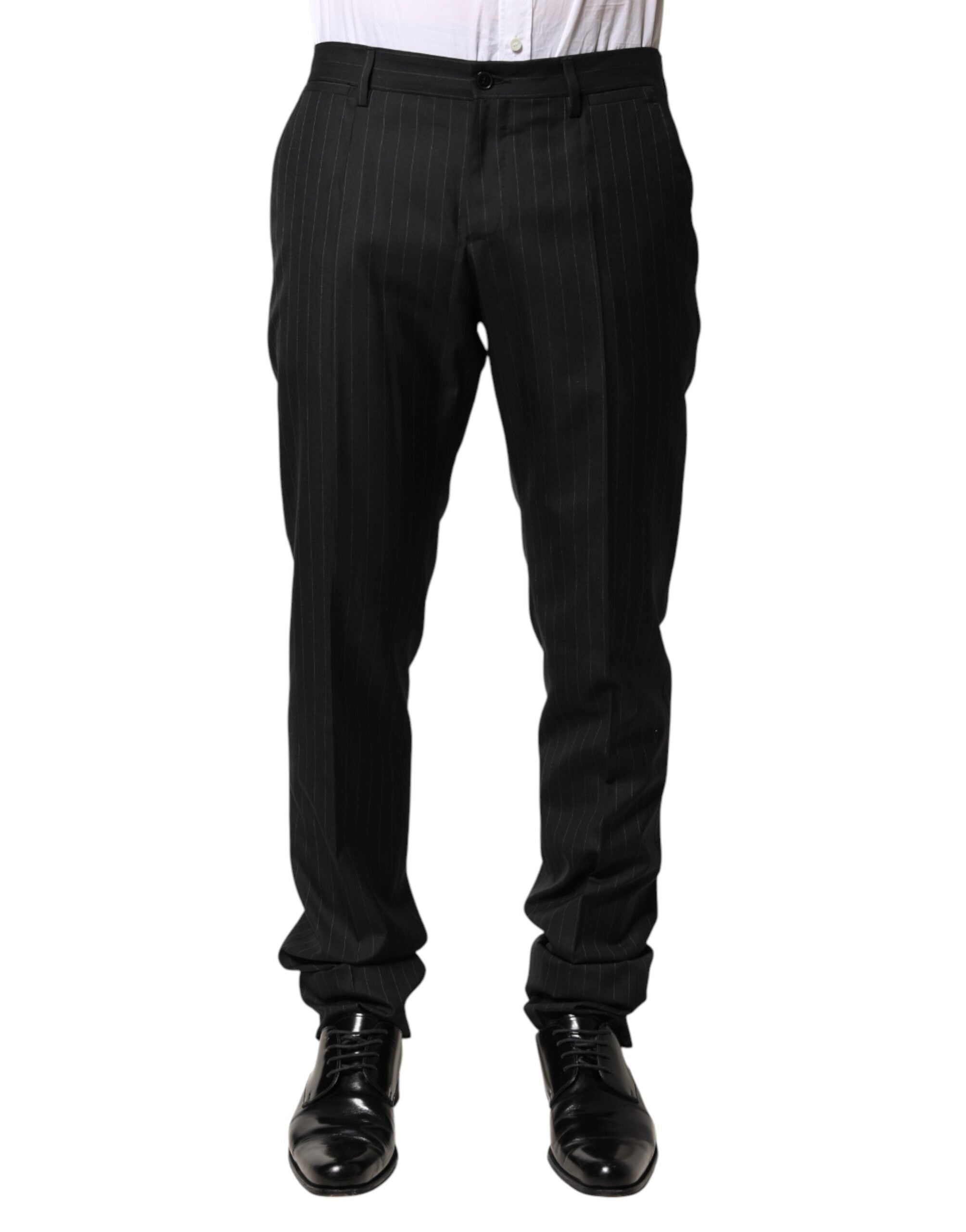Pantalon homme Dolce & Gabbana en laine noire à rayures, style habillé avec coupe ajustée et détails élégants.