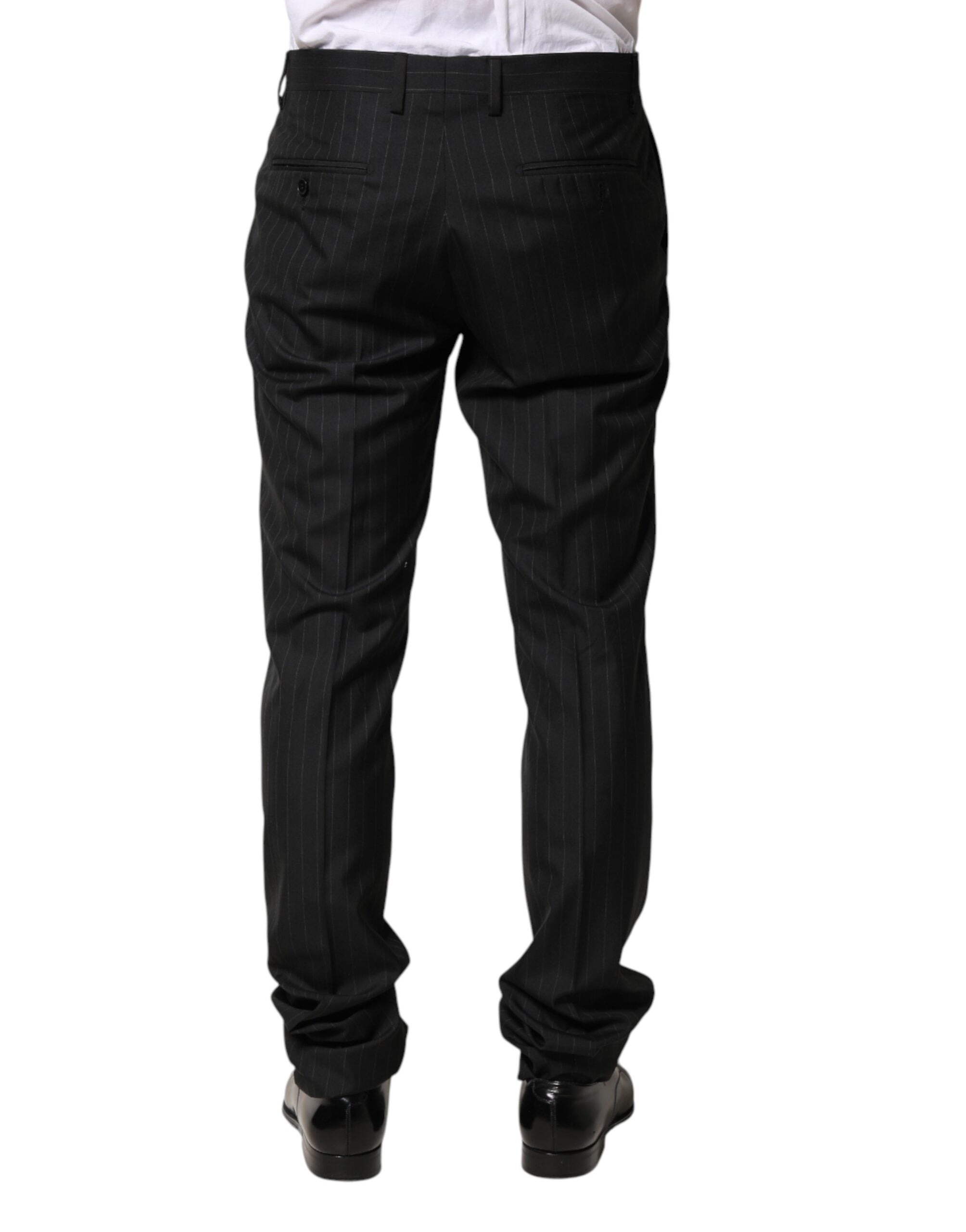 Pantalon homme Dolce & Gabbana en laine noire à rayures, costume élégant avec coupe classique et détails sophistiqués.