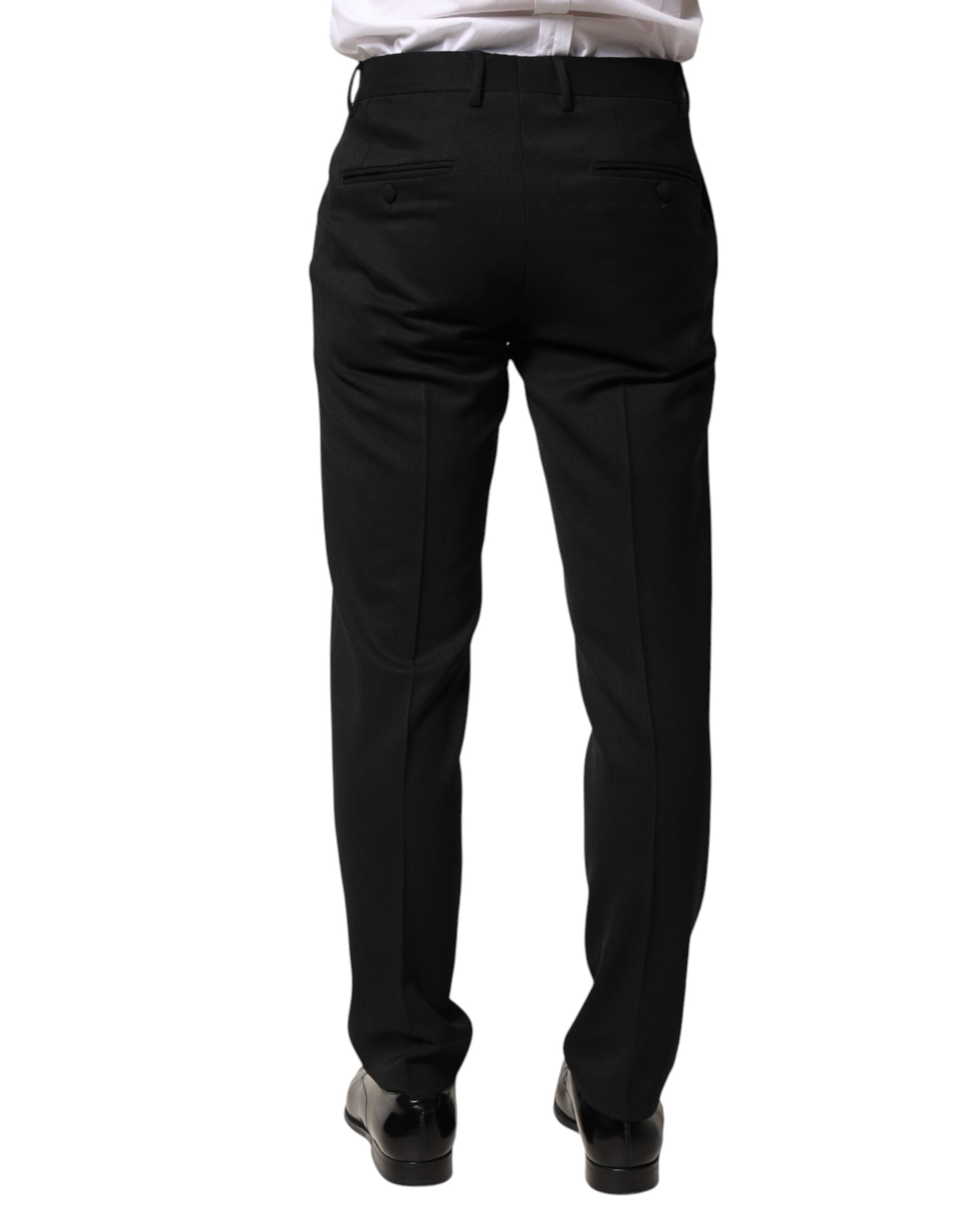 Pantalon homme Dolce & Gabbana en laine noire, taille moyenne, style élégant et classique.