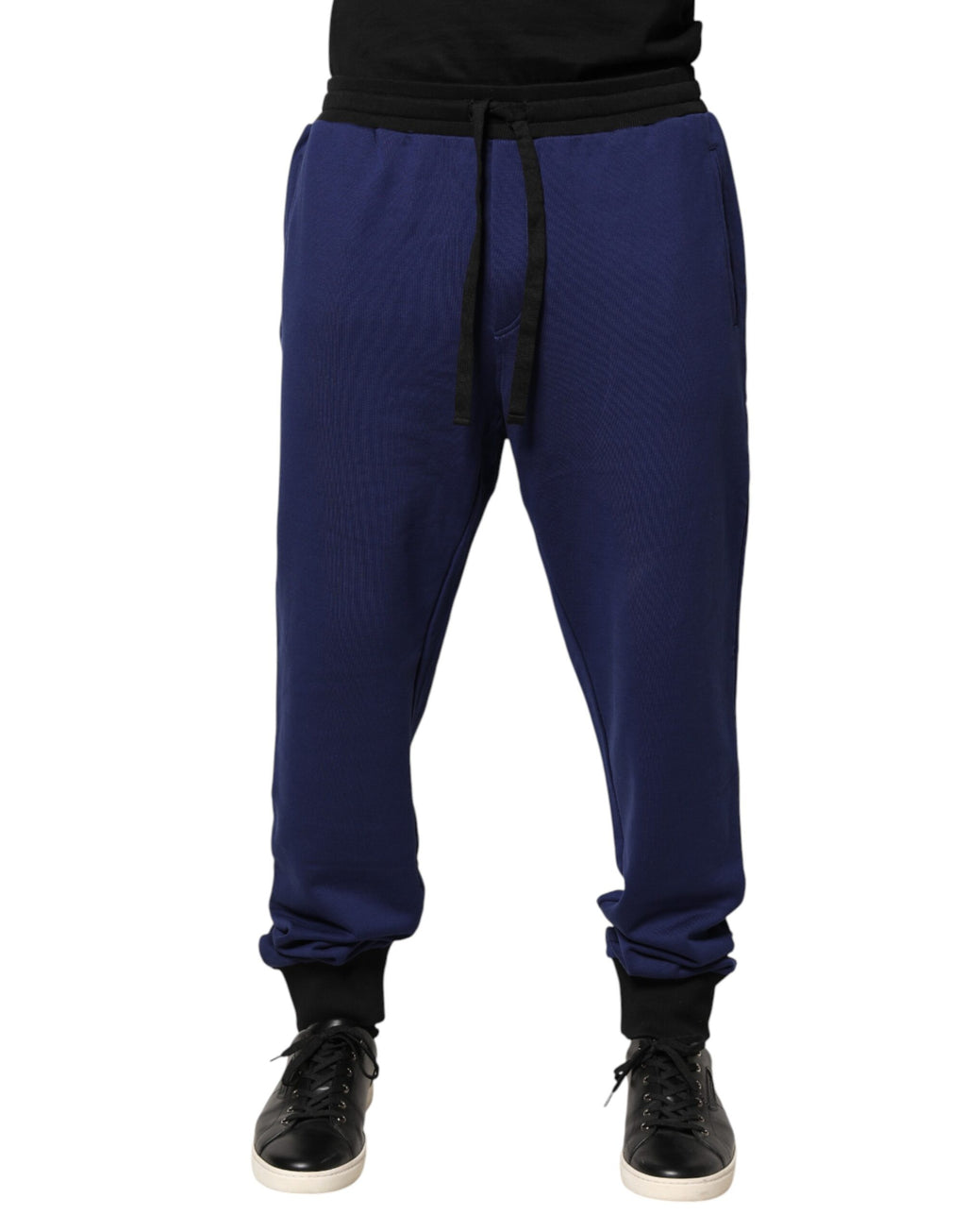 Pantalon jogger en coton bleu Dolce & Gabbana, taille mi-haute, avec détails de style décontracté.