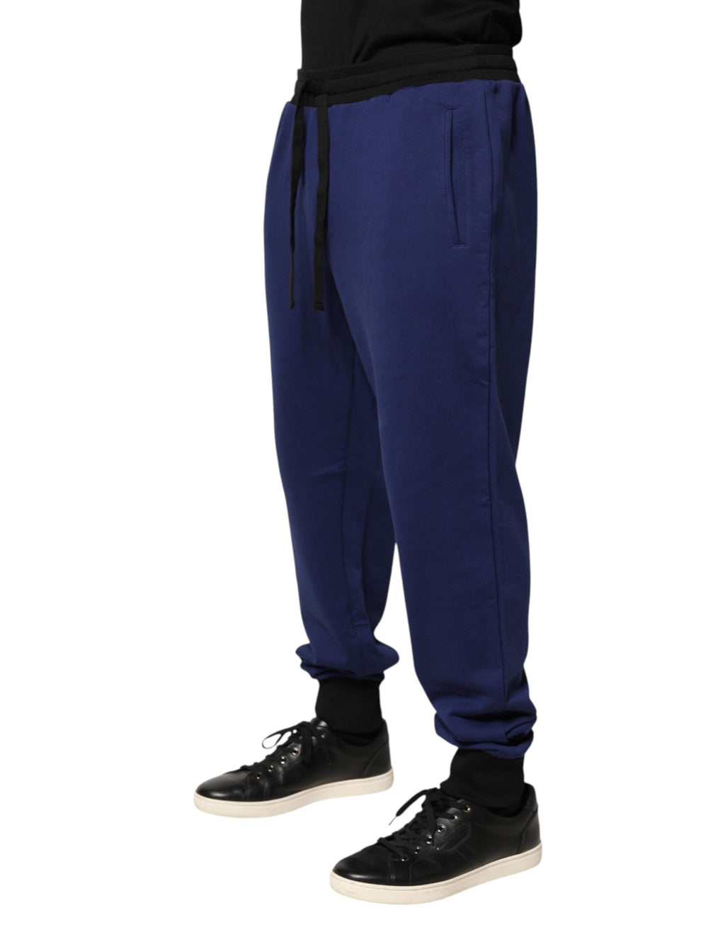 Pantalons joggers Dolce & Gabbana en coton bleu, taille moyenne, avec coupe décontractée et style moderne.