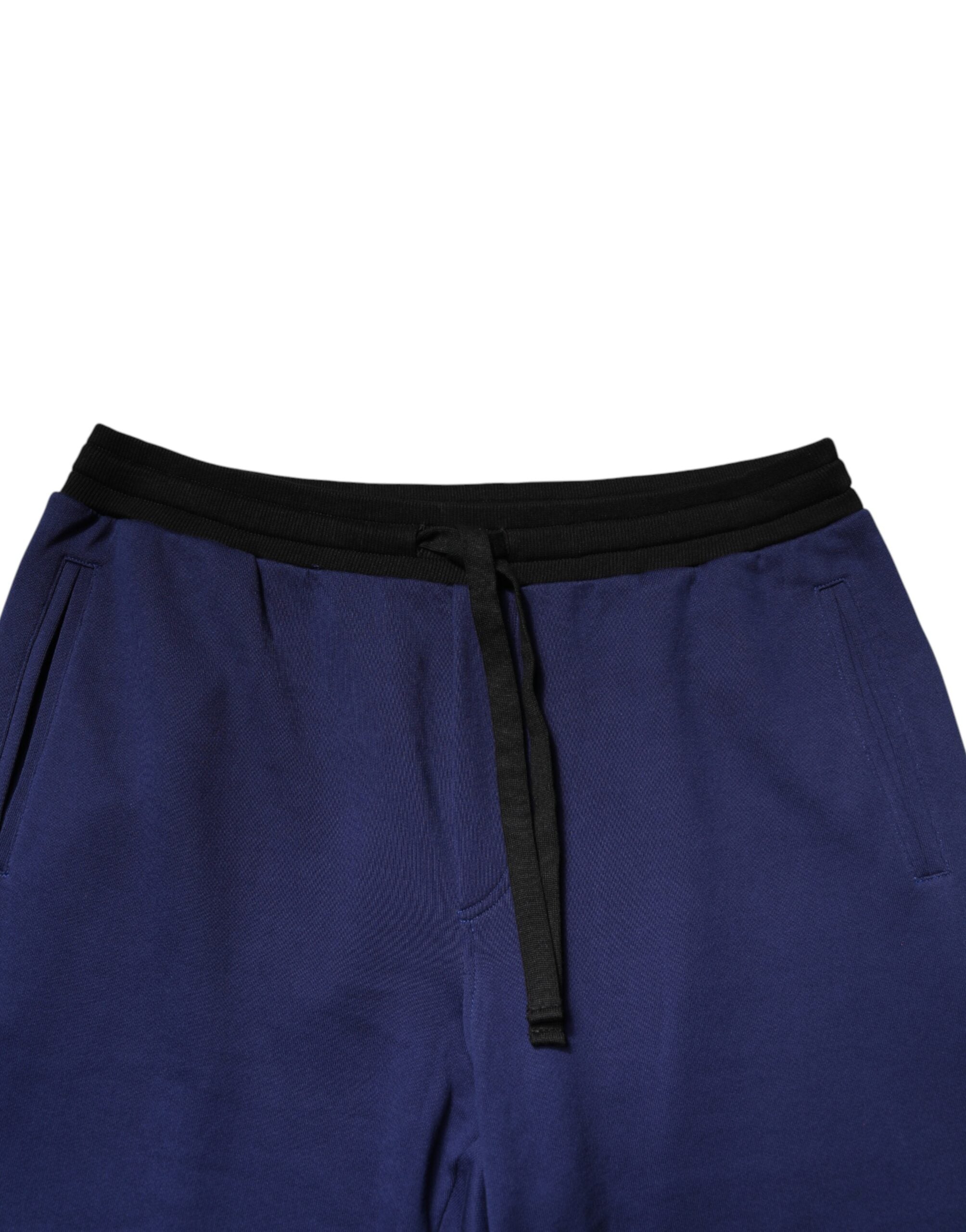 Pantalon jogger en coton bleu à taille moyenne de Dolce & Gabbana, style décontracté et confortable.