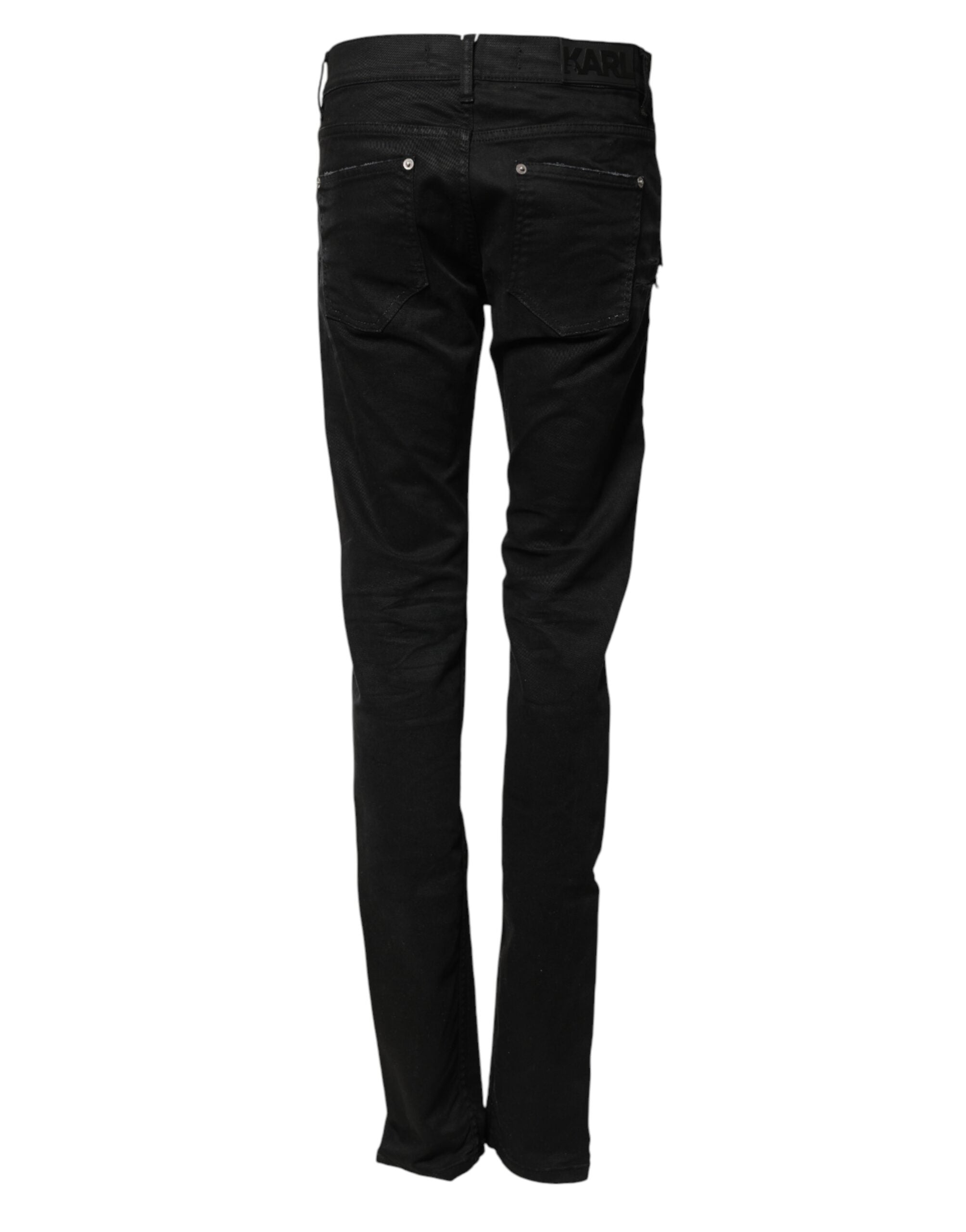 Jean slim noir pour homme de Karl Lagerfeld, déchiré et tendance, en denim skinny avec un style usé et moderne.