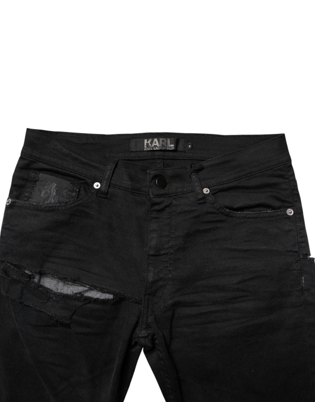 Jeans slim noirs pour hommes Karl Lagerfeld, déchirés et tendance, en denim skinny avec détails usés.