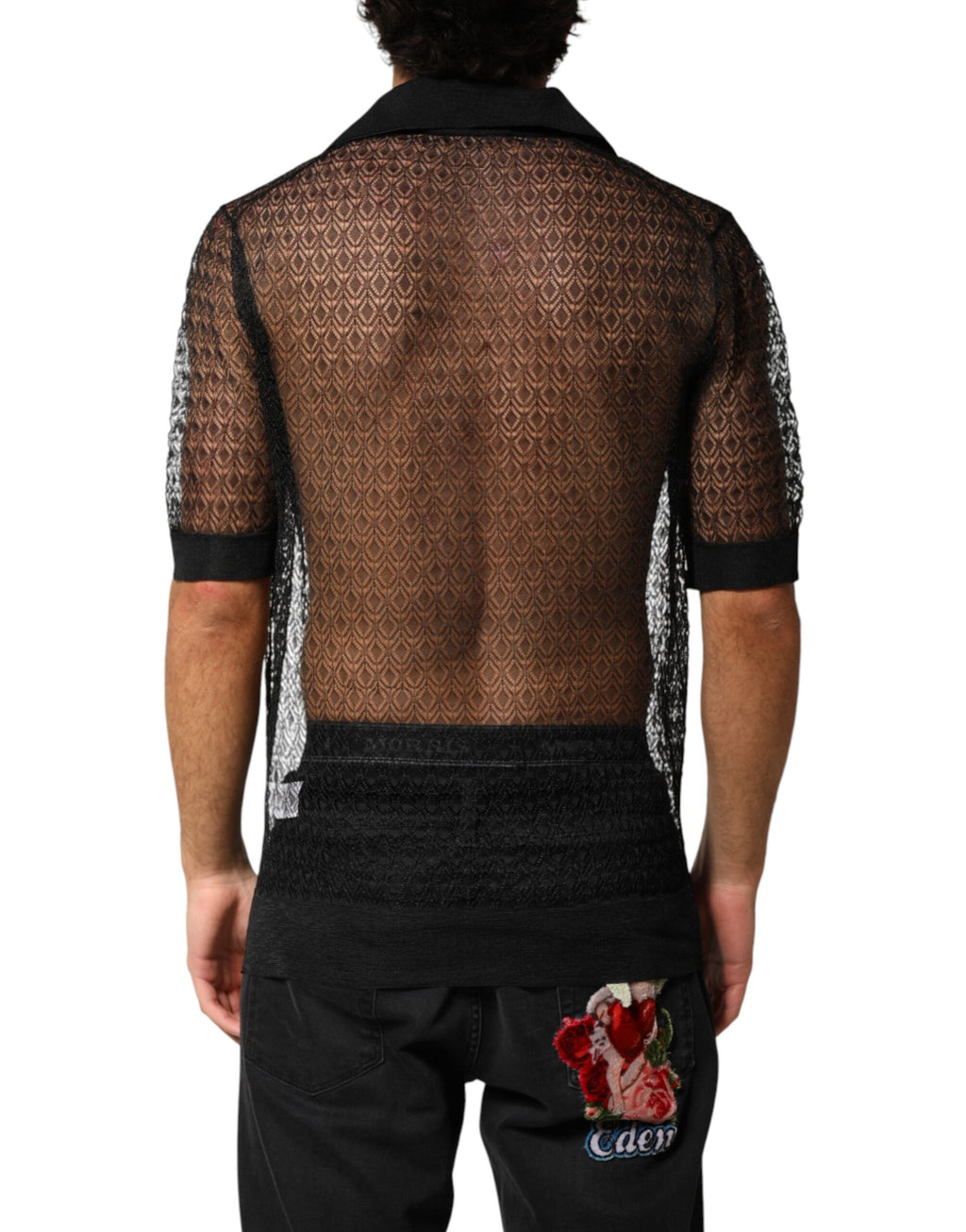 Polo décontracté noir à manches courtes de Dolce & Gabbana, tissu léger et transparent, style casual élégant pour femme.