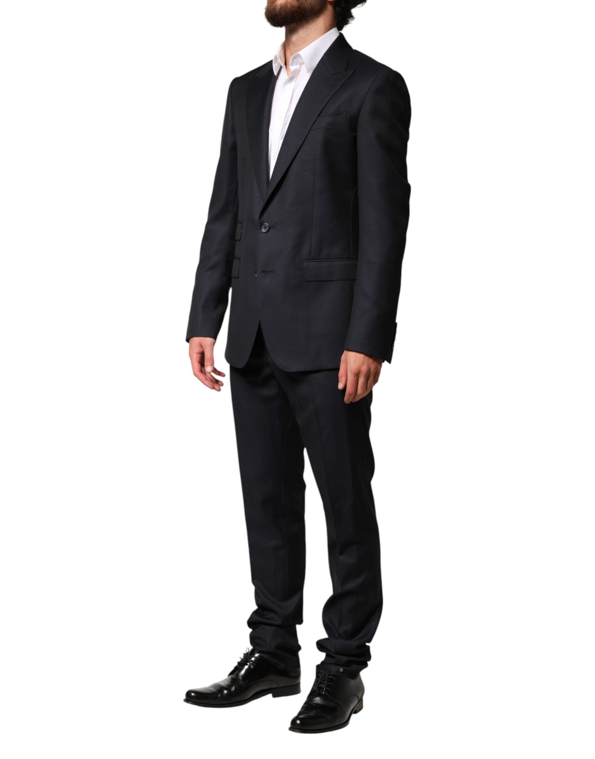 Costume homme noir en laine Dolce & Gabbana, veste à un bouton et pantalon assorti, style élégant et sophistiqué.