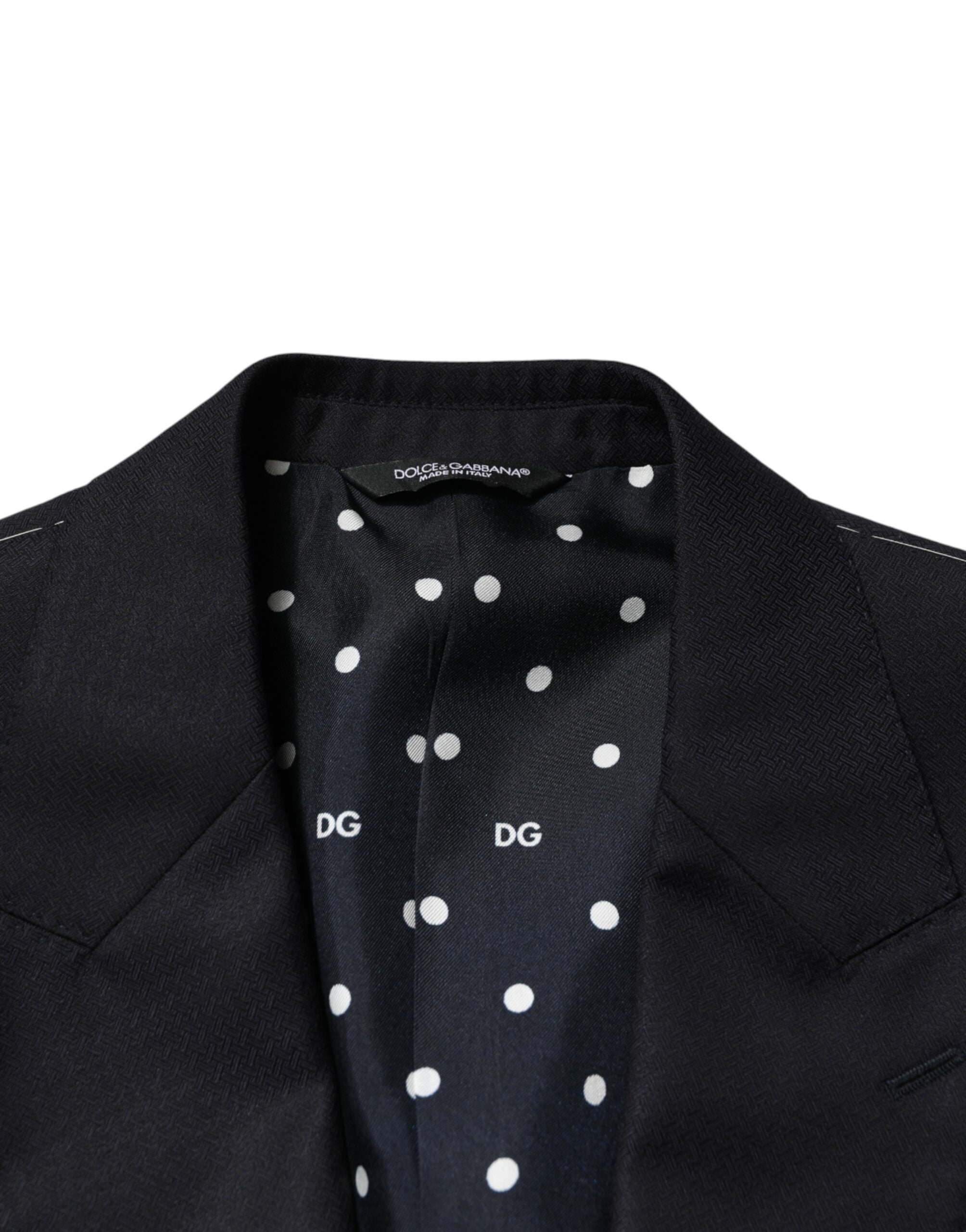 Costume homme noir en laine Dolce & Gabbana, costume deux pièces à boutonnière simple, style élégant et classique.