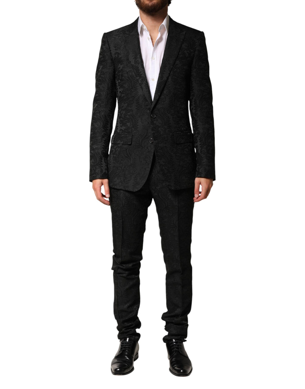 Costume homme Dolce & Gabbana en brocart noir, deux pièces, veste à double boutonnage et pantalon assorti.