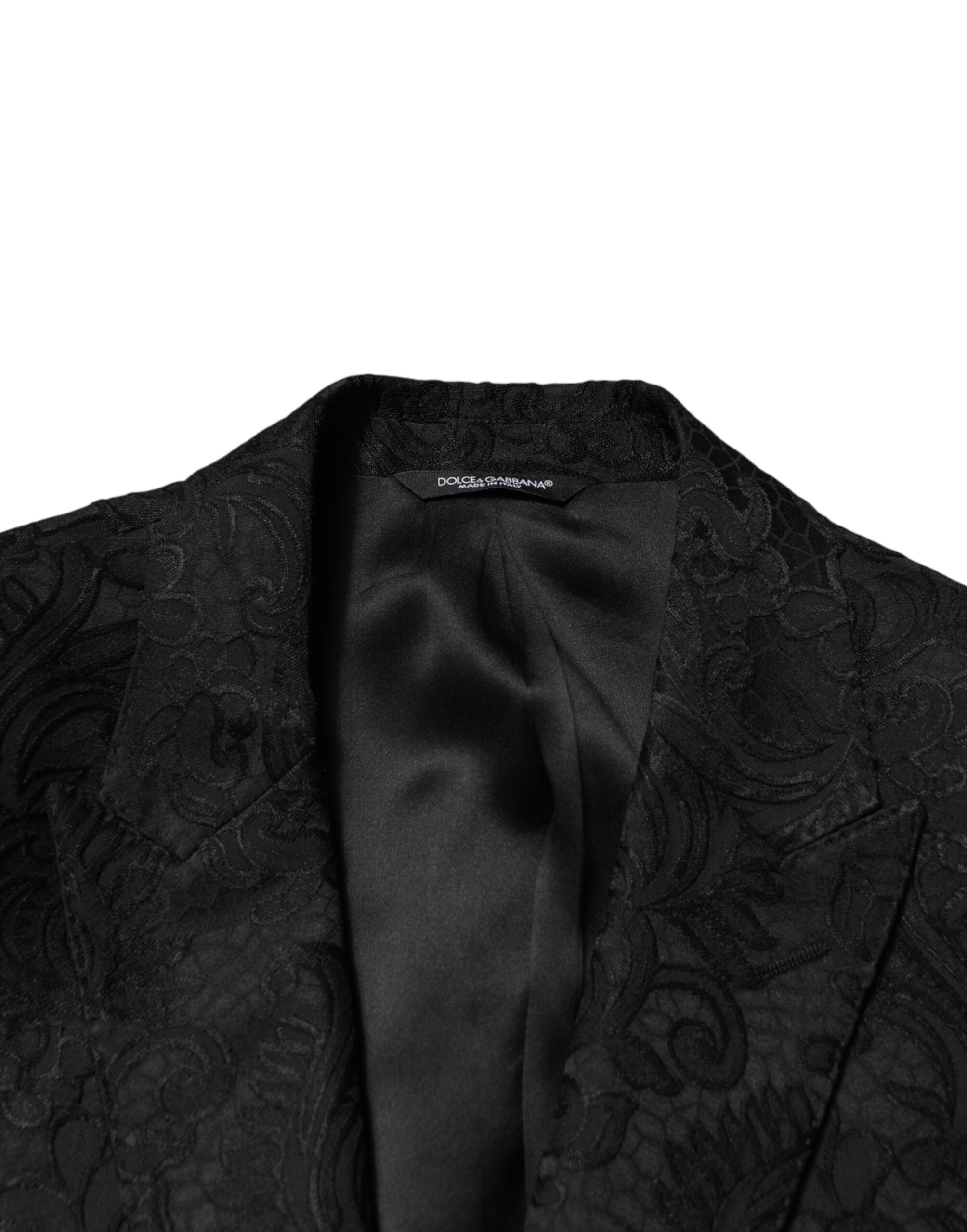 Costume deux pièces en brocart noir Dolce & Gabbana, veste à un bouton et pantalon assorti, élégant et sophistiqué.
