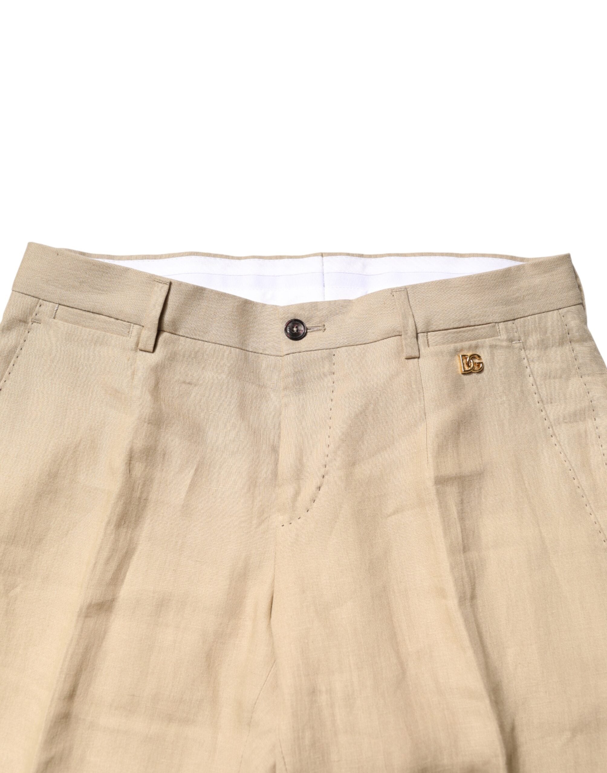 Costume deux pièces en lin beige Dolce & Gabbana, veste croisée à boutonnière simple et pantalon assorti, élégant et classique.
