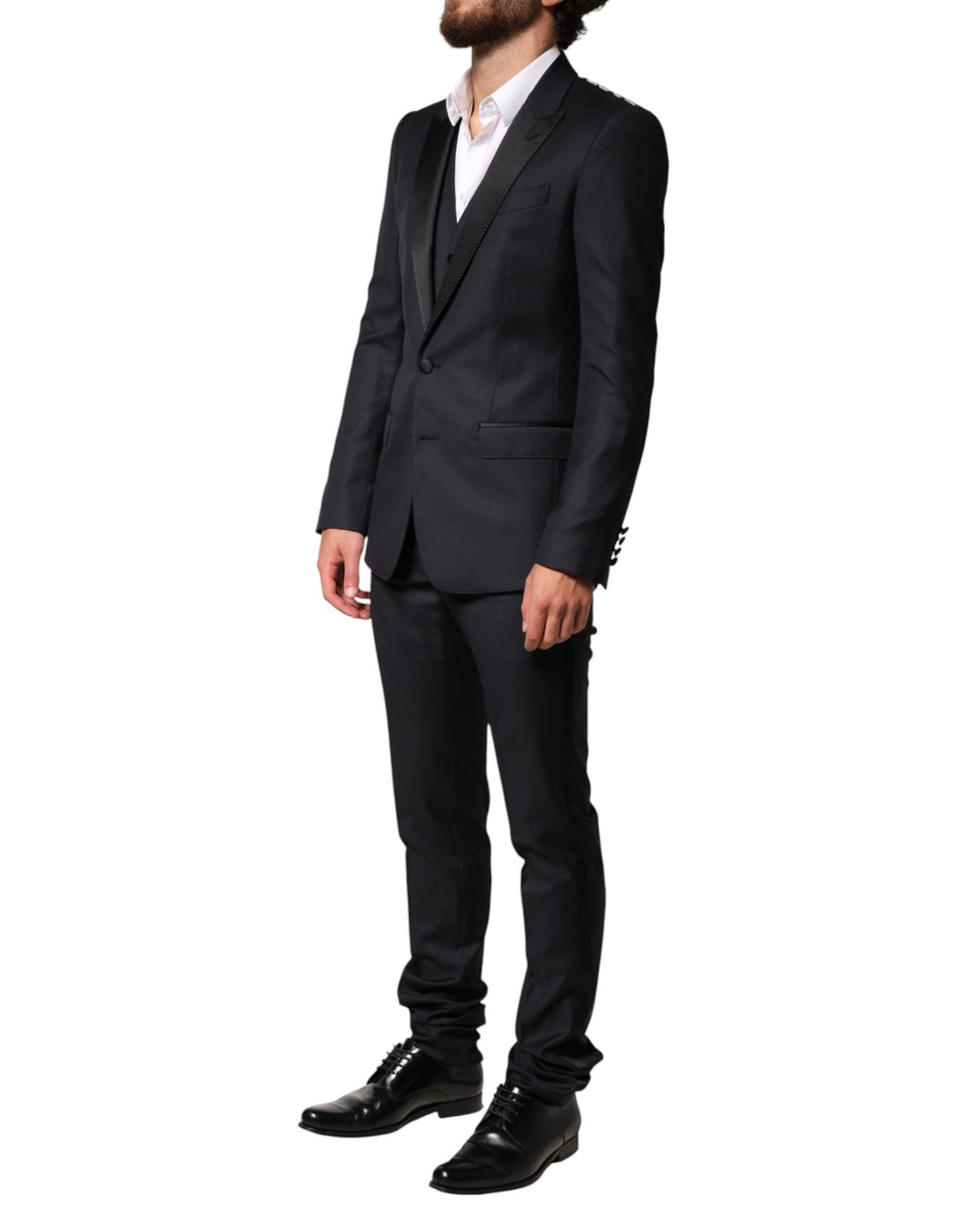 Costume homme en laine bleue Dolce & Gabbana, costume trois pièces à fermeture simple, élégant et sophistiqué.