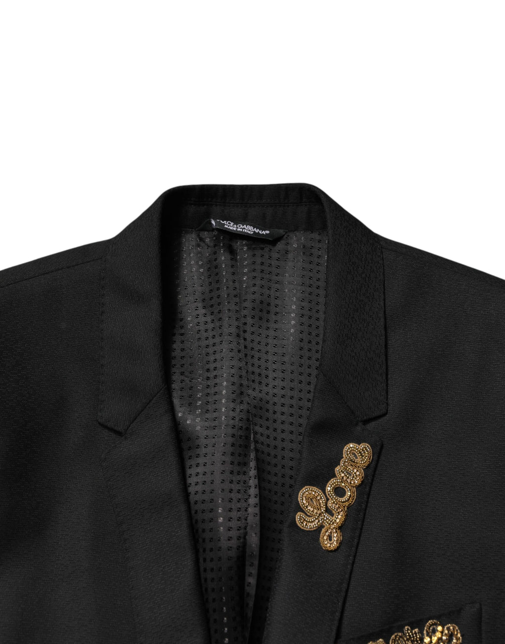 Costume deux pièces Dolce & Gabbana noir avec embellissements, veste à un bouton et pantalon assorti, élégant et sophistiqué.