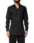Chemise homme Dolce & Gabbana en coton noir avec détails dorés pour tenue formelle élégante.