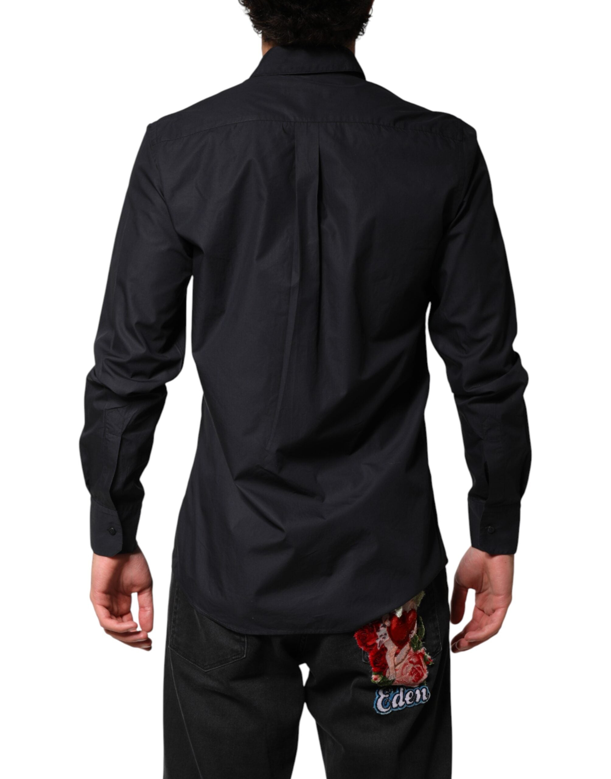 Chemise longue en coton noir de Dolce & Gabbana, robe formelle à manches longues, style élégant et sophistiqué.
