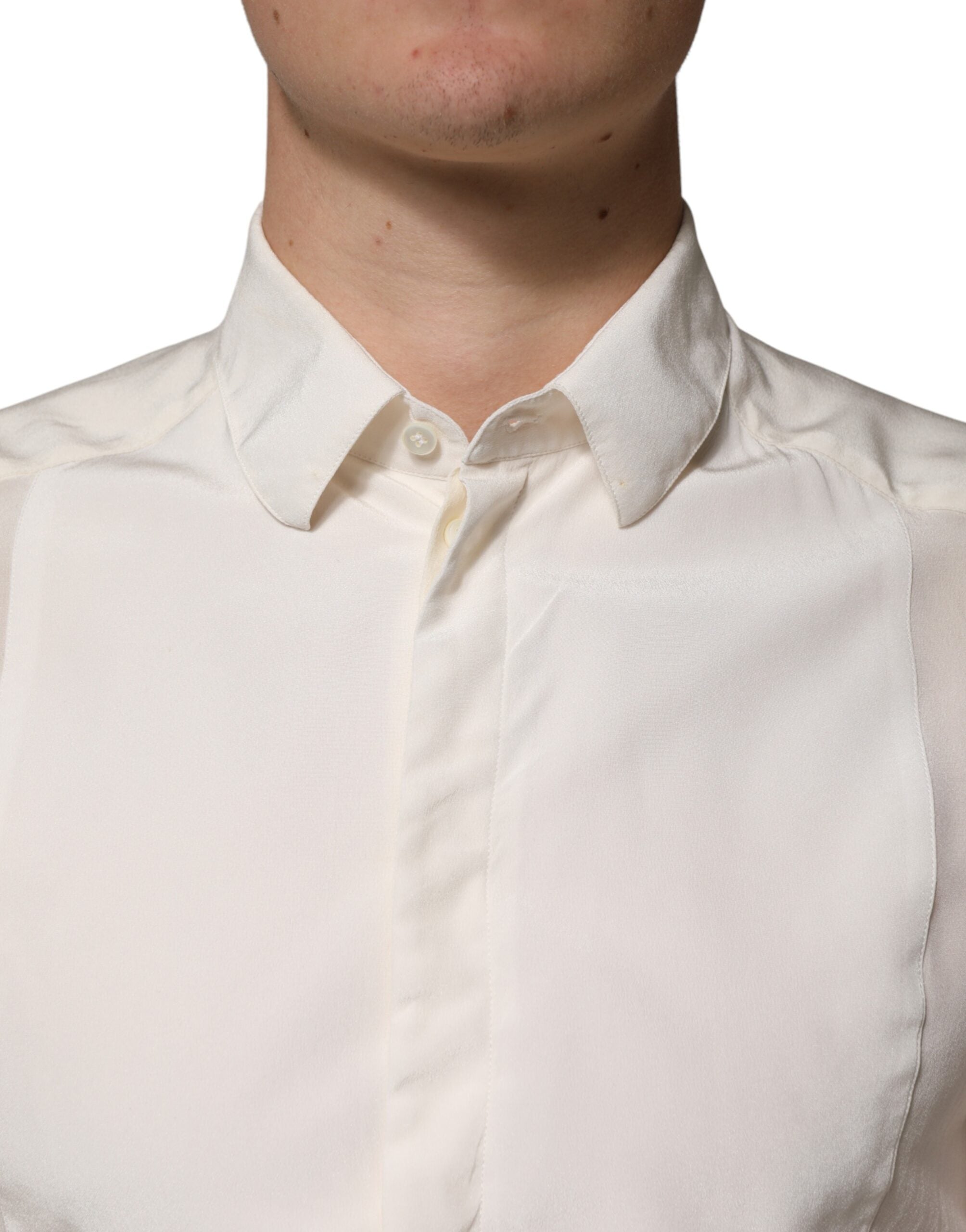 Chemise formelle en soie blanche Dolce & Gabbana pour hommes, avec détails dorés, élégante et sophistiquée.