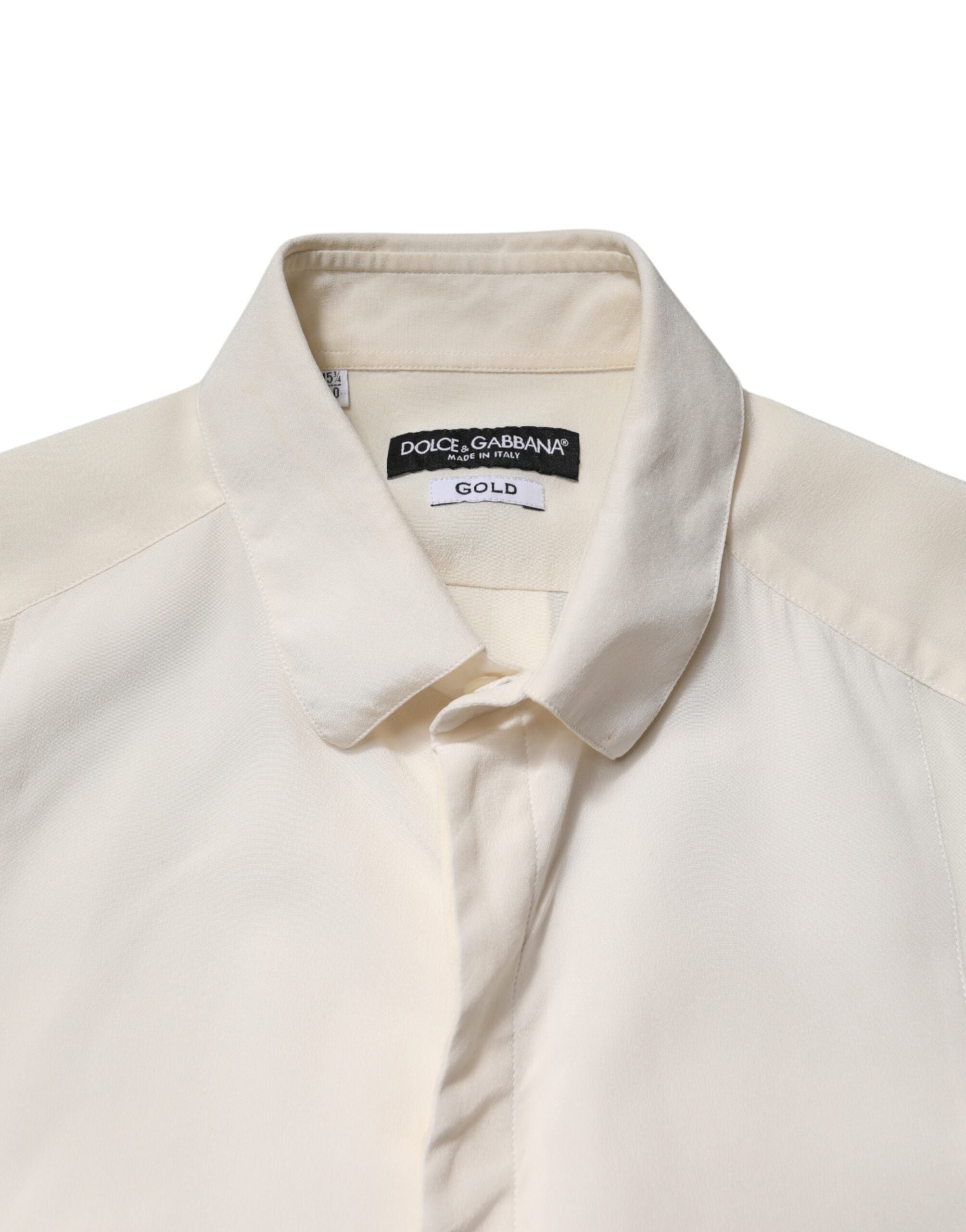 Chemise formelle en soie blanche Dolce & Gabbana pour homme avec détails dorés.