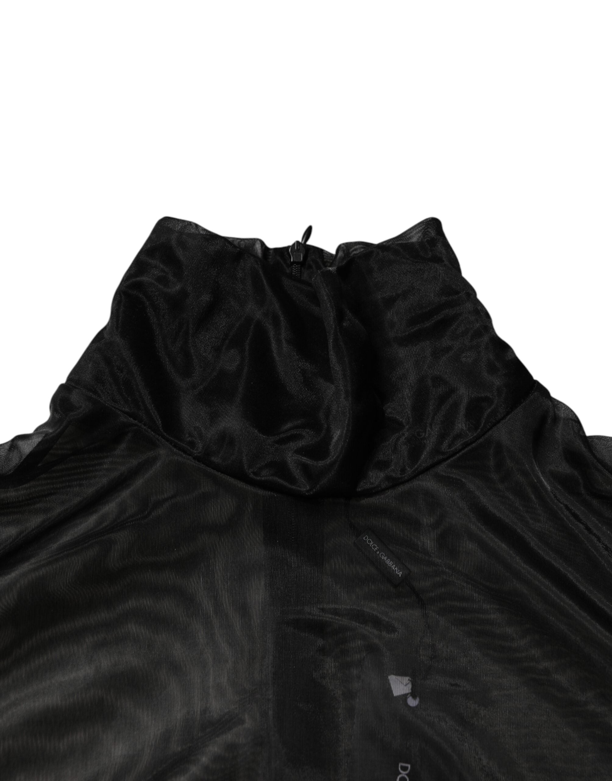 T-shirt à col roulé en dentelle noire Dolce & Gabbana à manches longues, style transparent et élégant.
