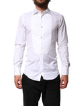 Chemise formelle blanche Dolce & Gabbana en coton avec col orné d’un bib élégant et sophistiqué.